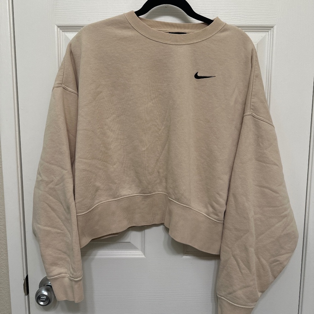 Light sand colored Nike crewneck